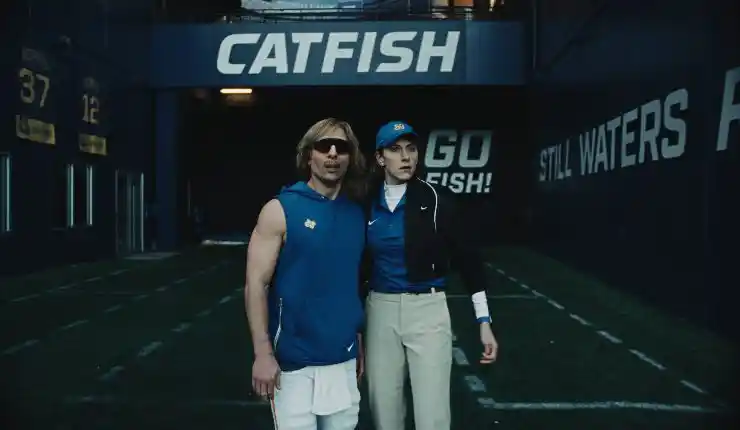 Chad stands under catatfish sign in Chad Powers Season 2