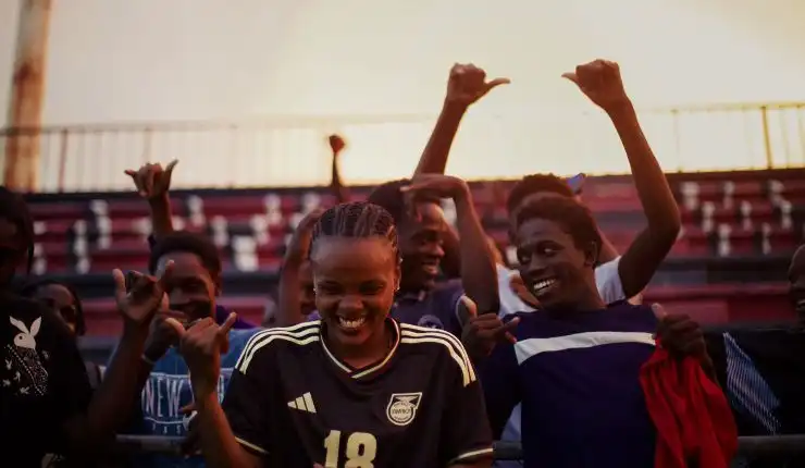 A group of young women enjoy a laugh in Reggae Girlz