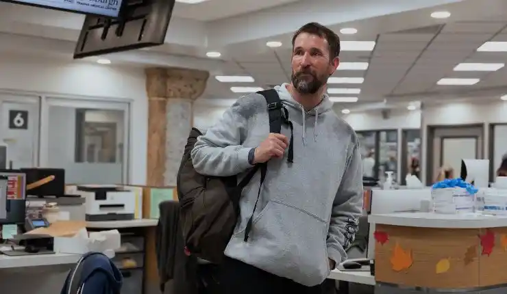 Dr Robby walks into the hospital for his shift n The Pitt Season 3