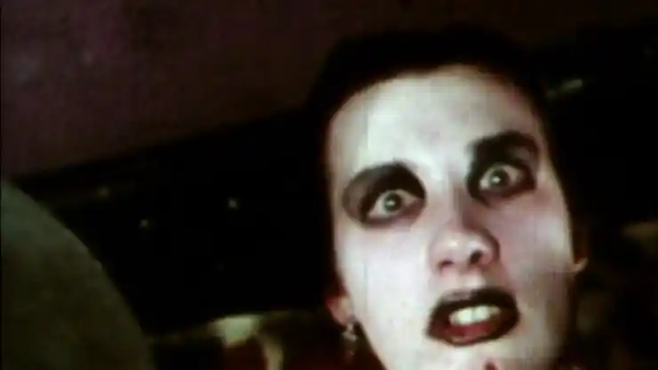 a scary looking woman in 50 yers of punk documentary