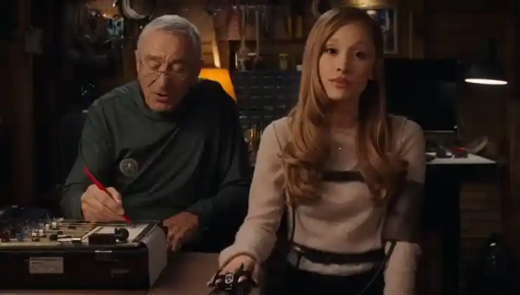 An older man questions an younger woman in Focker In Law