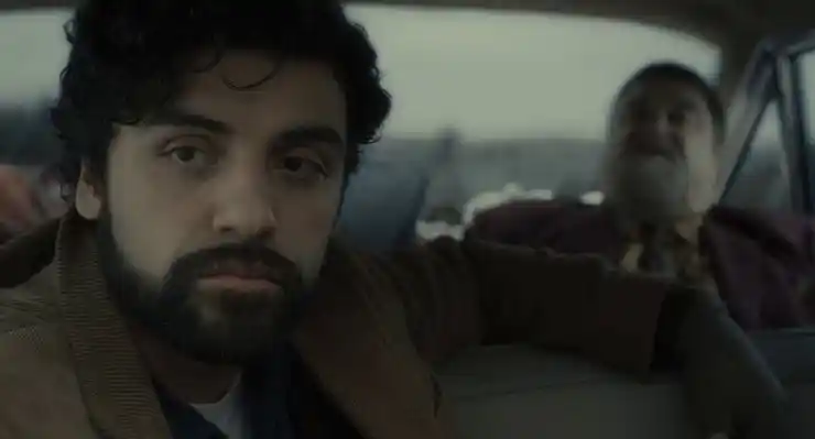 oscar Isaac and John Goodman sit in a car in Inside Llewyn Davis