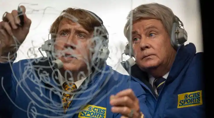 John Madden with fellow commentator in Madden