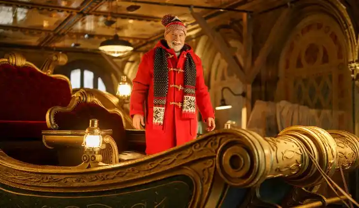 Arnie is back, he is Father Christmas in the man with the bag