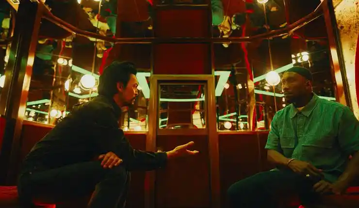 Two men chat in Your Mother Your Mother Your Mother