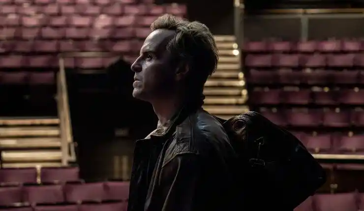 A man walks into a studio or theatre in Elsinore (Studiocanal UK)